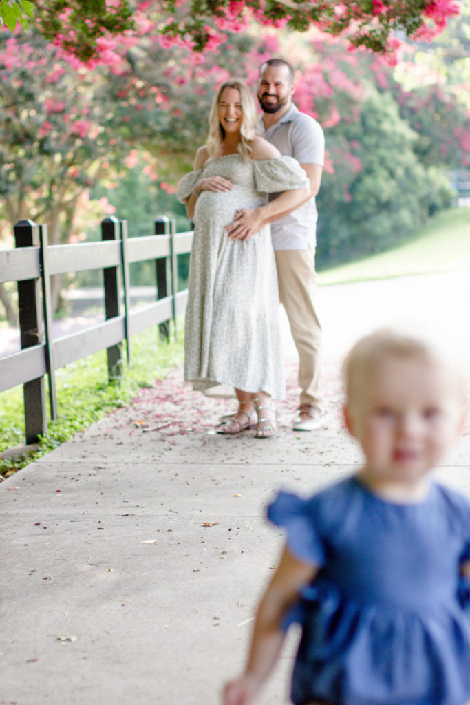 A family during a family mini session and maternity mini session in Greenville, SC by Jenny Macy Photography.