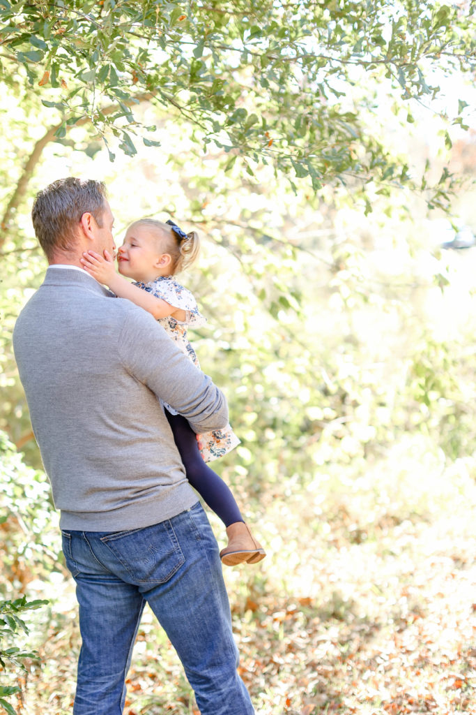 A little girl and her dad during a fall family session in Greenville, SC by Jenny Macy Photography.