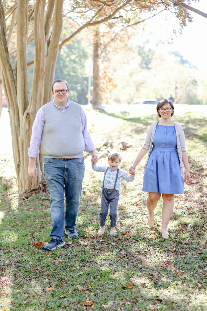 A little boy and his mom an dad during a fall mini session in Greenville, SC with Jenny Macy Photography.